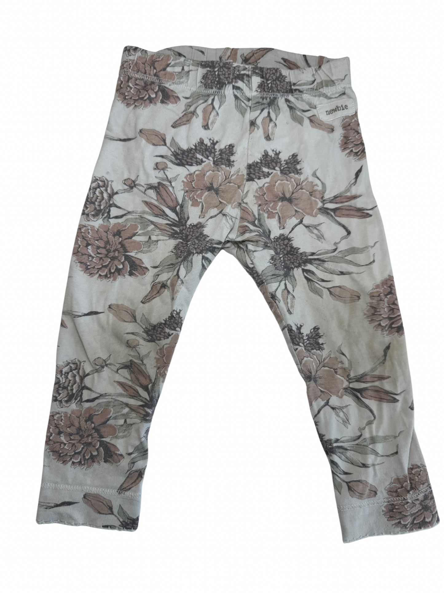 Creme leggings med blomster og flæser på numsen